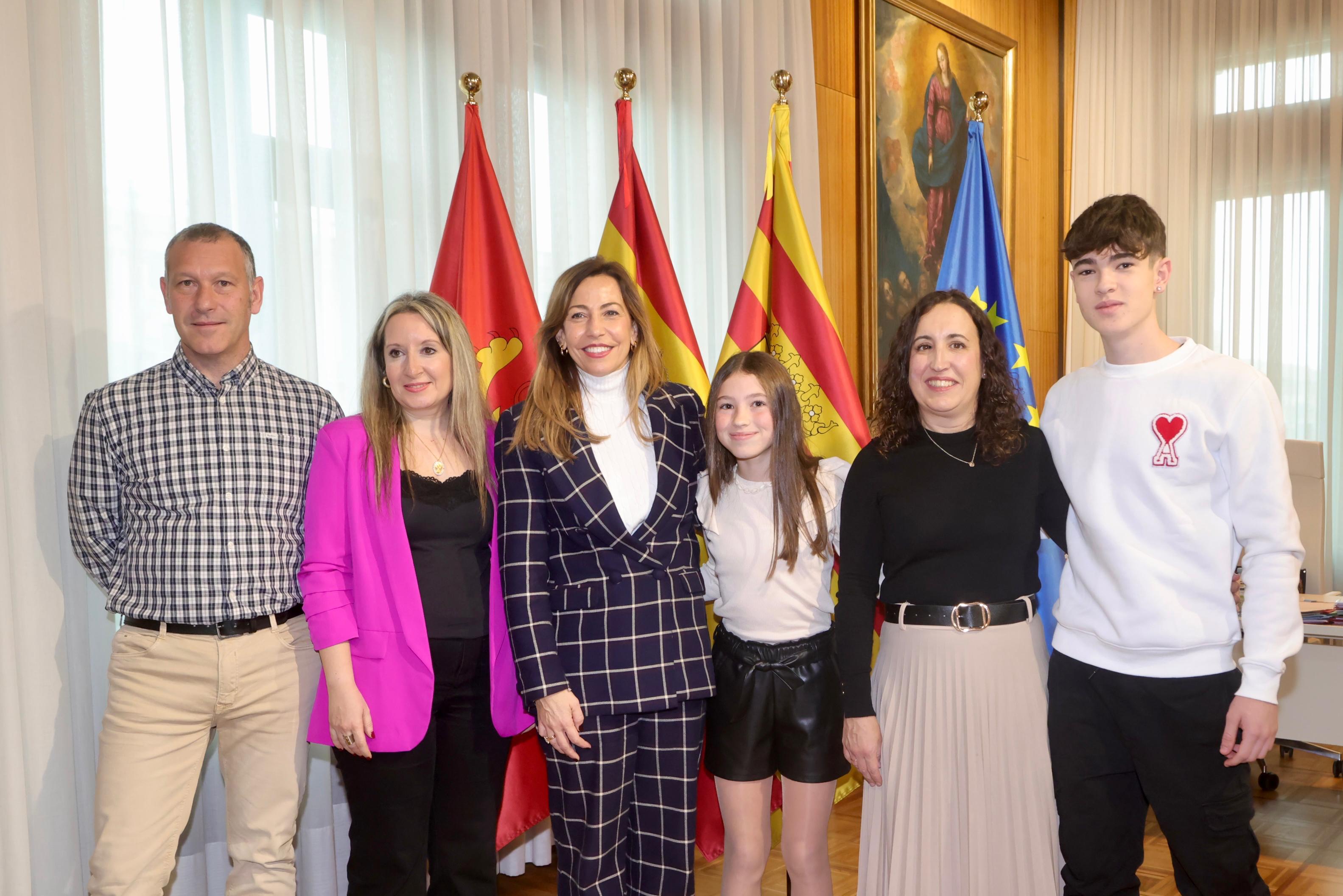 Carla con su familia